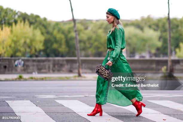 Angelica Ardasheva wears a green dress, red shoes, outside Kaviar Gauche, during Paris Fashion Week Womenswear Spring/Summer 2018, on September 29,...