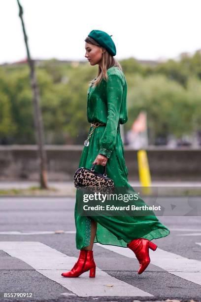 Angelica Ardasheva wears a green dress, red shoes, outside Kaviar Gauche, during Paris Fashion Week Womenswear Spring/Summer 2018, on September 29,...