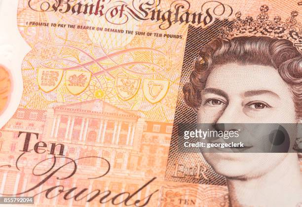 new uk ten pound note with portrait of queen elizabeth ii - ten pound note stock pictures, royalty-free photos & images