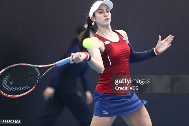 Christina McHale of the United States reacts against Aryna Sabalenka of Belarus during Women's singles qualification match of 2017 China Open at...