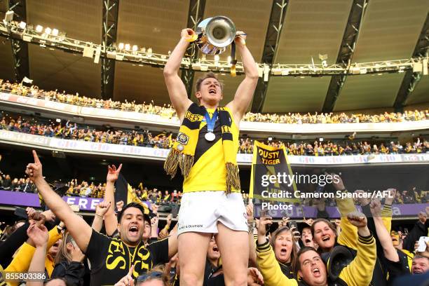 Jack Riewoldt of the Tigers celebrates with fans after winning the 2017 AFL Grand Final match between the Adelaide Crows and the Richmond Tigers at...