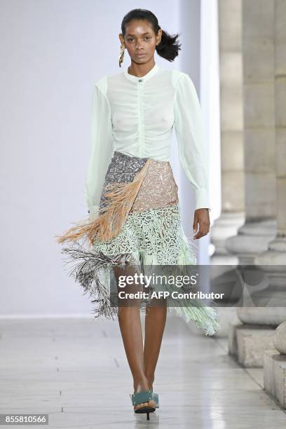 Model presents a creations by Veronique Leroy during the women's 2018 Spring/Summer ready-to-wear collection fashion show in Paris, on September 30,...