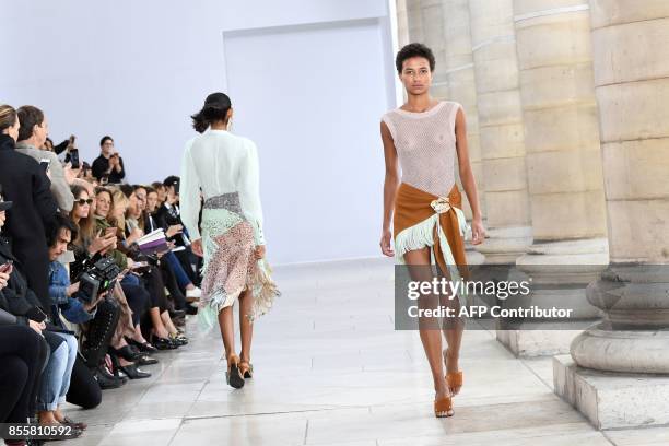 Models present creations by Veronique Leroy during the women's 2018 Spring/Summer ready-to-wear collection fashion show in Paris, on September 30,...