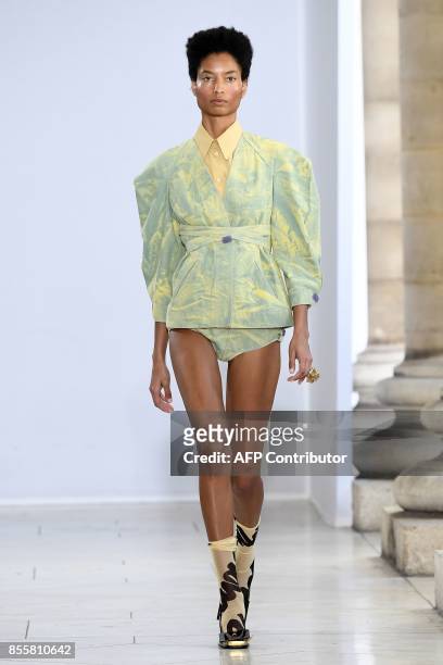 Model presents a creations by Veronique Leroy during the women's 2018 Spring/Summer ready-to-wear collection fashion show in Paris, on September 30,...