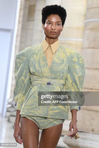 Model presents a creation by Veronique Leroy during the women's 2018 Spring/Summer ready-to-wear collection fashion show in Paris, on September 30,...