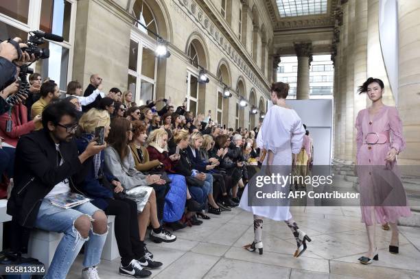 Models present creations by Veronique Leroy during the women's 2018 Spring/Summer ready-to-wear collection fashion show in Paris, on September 30,...