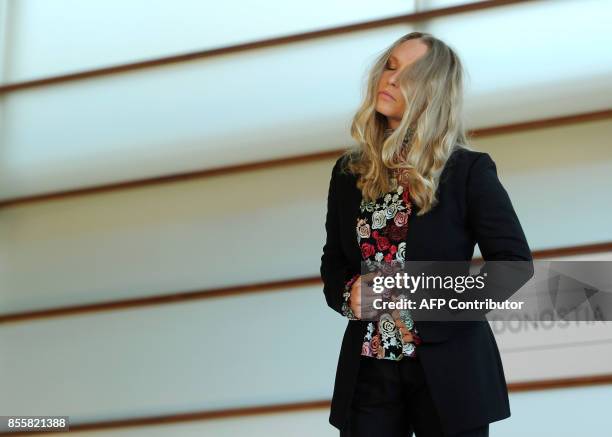 Actress Annie Starke poses during a photocall to promote her film "The Wife" during the 65th San Sebastian Film Festival, in the northern Spanish...