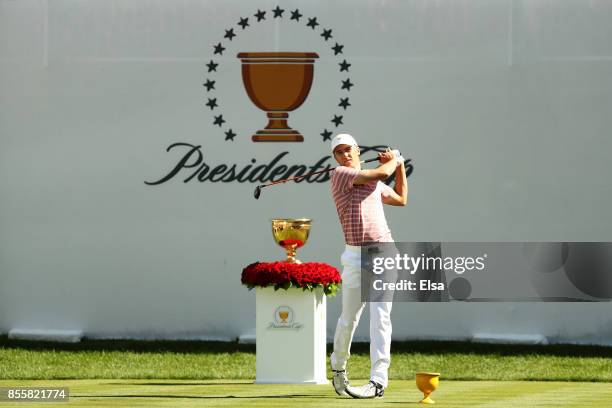 Jordan Spieth of the U.S. Team plays his shot from the first tee during Friday four-ball matches of the Presidents Cup at Liberty National Golf Club...