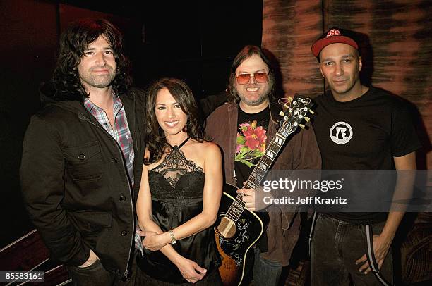 Musicians Pete Yorn of Phantom Planet, Suzanna Hoffs, Matthew Sweet and Tom Morello pose backstage after the KCRW Gimme Shelter benefit concert at...