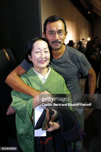 Countess Setsuko Klossowska de Rola and stylist Haider Ackermann pose Backstage after the Haider Ackermann show as part of the Paris Fashion Week...