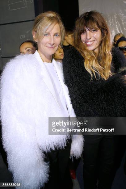 Elizabeth von Guttman and Lou Doillon, both dressed in Haider Ackermann, pose Backstage after the Haider Ackermann show as part of the Paris Fashion...