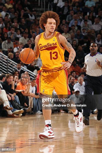 Delonte West of the Cleveland Cavaliers moves the ball up court during the game against the Phoenix Suns at US Airways Center on March 12, 2009 in...