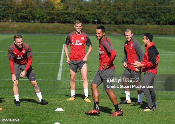 Aaron Ramsey, Rob Holding, Theo Walcott, Jack Wilshere and Alexis Sanchez of Arsenal during a training session at London Colney on September 30, 2017...