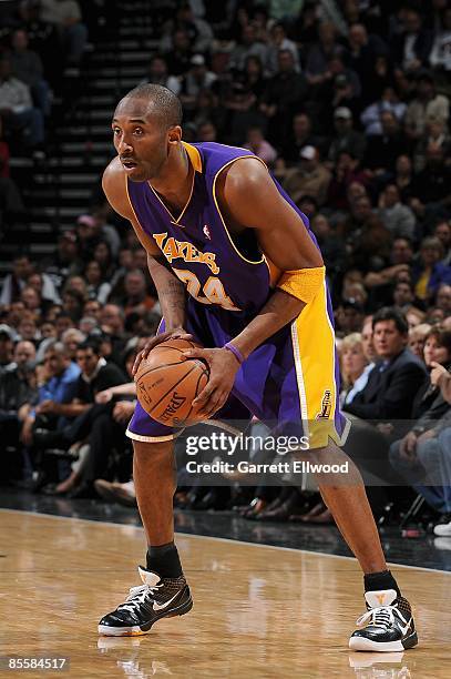 Kobe Bryant of the Los Angeles Lakers moves the ball to the basket during the game against the San Antonio Spurs on March 12, 2009 at the AT&T Center...