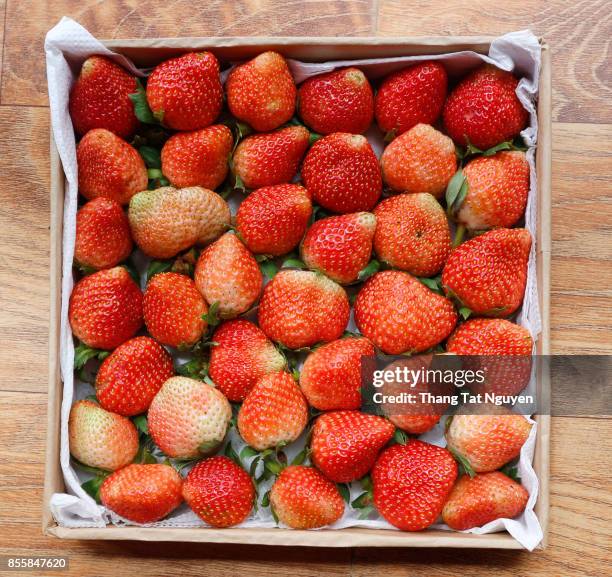 strawberries pack in paper box - red breakfast graphics stock pictures, royalty-free photos & images