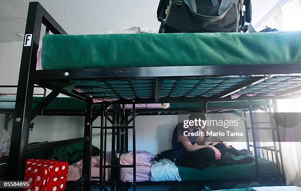 Johanna O'Toole rests in the Jazz on the Villa hostel March 24, 2009 in New York City. Hostels provide an attractive alternative in the global...