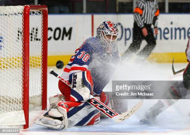 Henrik Lundqvist of the New York Rangers makes a save against the Minnesota Wild at Madison Square Garden March 24, 2009 in New York City.