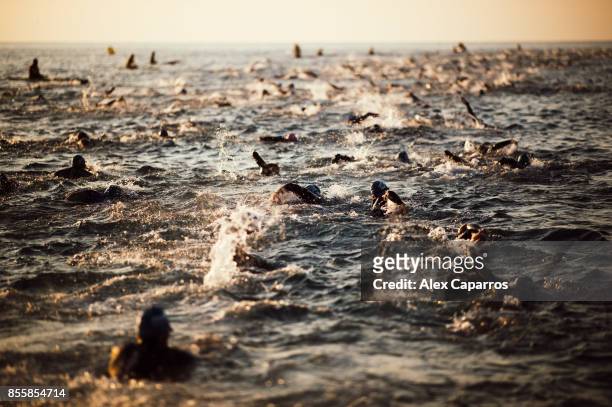 Athletes start the swimming course of the IRONMAN Barcelona on September 30, 2017 in Calella, Barcelona province, Spain.