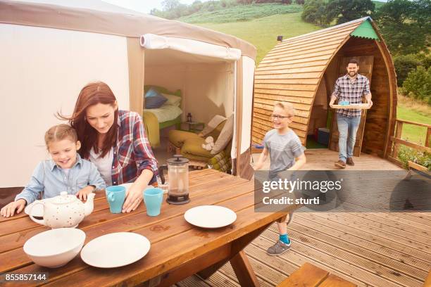 breakfast for glamping family - yurt stock pictures, royalty-free photos & images