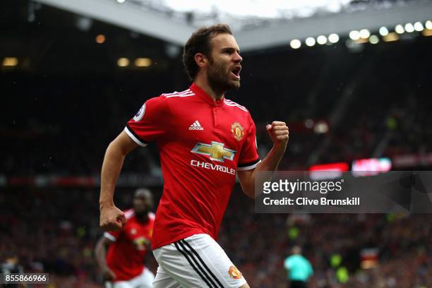 Juan Mata of Manchester United celebrates scoring the opening goal during the Premier League match between Manchester United and Crystal Palace at...