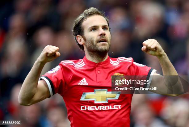 Juan Mata of Manchester United celebrates scoring the opening goal during the Premier League match between Manchester United and Crystal Palace at...