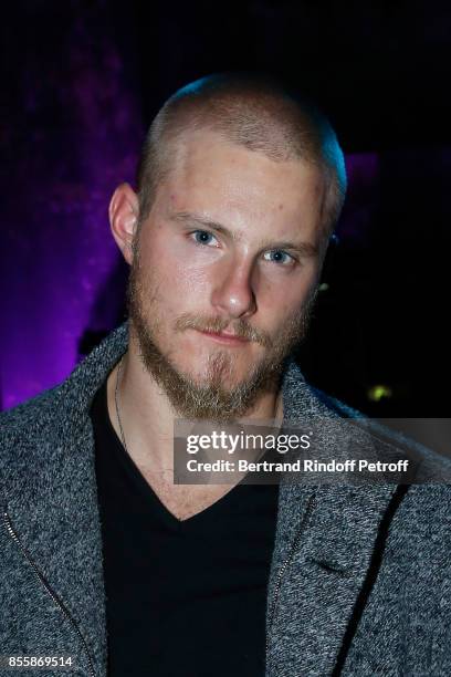 Actor Alexander Ludwig attends the Elie Saab show as part of the Paris Fashion Week Womenswear Spring/Summer 2018 on September 30, 2017 in Paris,...