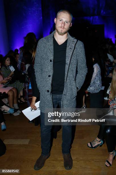 Actor Alexander Ludwig attends the Elie Saab show as part of the Paris Fashion Week Womenswear Spring/Summer 2018 on September 30, 2017 in Paris,...