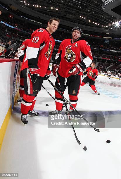 Jason Spezza and Dany Heatley of the Ottawa Senators share a smile during warmups prior to a game against the New York Islanders at Scotiabank Place...