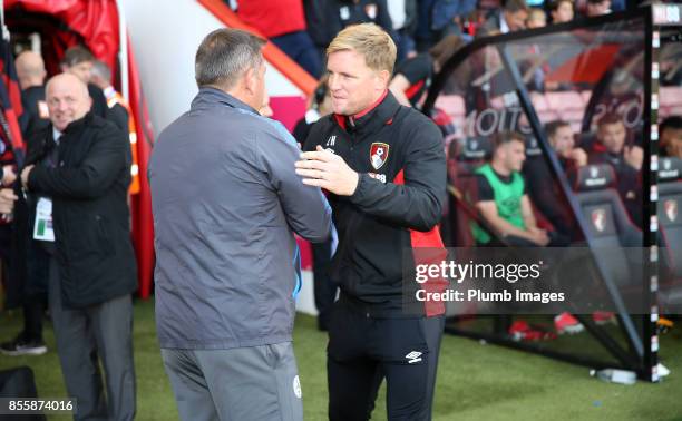 Manager Eddie Howe of Bournemouth welcomes Manager Craig Shakespeare of Leicester City to Vitality Stadium ahead of the Premier League match between...