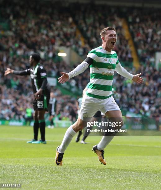 Callum McGregor of Celtic celebrates after he scores the opening goal during the Ladbrokes Scottish Premiership match between Celtic and Hibernian at...