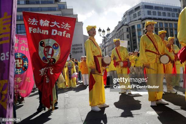 People demonstrate to support the practice of Falun Dafa in China , in Paris on September 30, 2017. China's officially atheist Communist authorities...