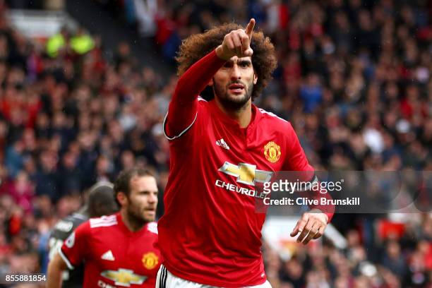 Marouane Fellaini of Manchester United celebrates scoring his side's second goal during the Premier League match between Manchester United and...