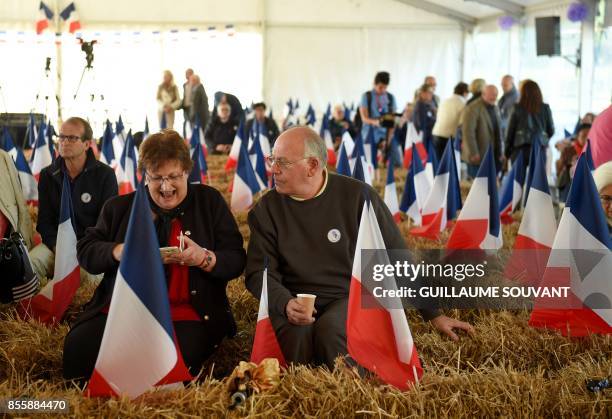 French right-wing Les Republicains party militants attend on September 30, 2017 at the "Fete de la Violette" , a political gathering organised by...