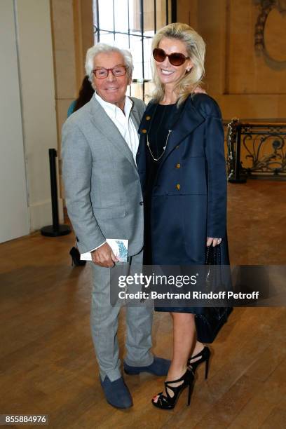 Jean-Daniel Lorieux and his companion Laura Restelli attend the Elie Saab show as part of the Paris Fashion Week Womenswear Spring/Summer 2018 on...
