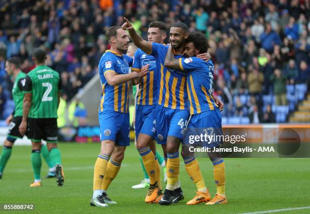 Stefan Payne of Shrewsbury Town celebrates with his team mates after scoring a goal to make it 1-0 during the Sky Bet League One match between...