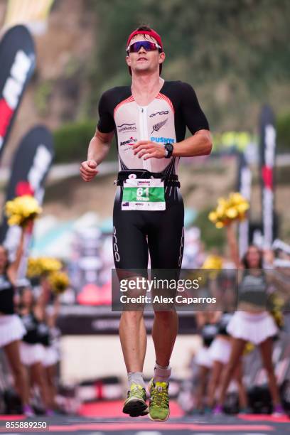 Mike Phillips of New Zealand crosses in 2nd position the finish line of the IRONMAN Barcelona on September 30, 2017 in Calella, Barcelona province,...