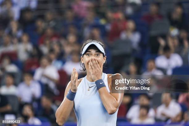 Caroline Garcia reacts after winning the ladies singles final between Ashleigh Barty of Australia and Caroline Garcia of France during Day 7of 2017...