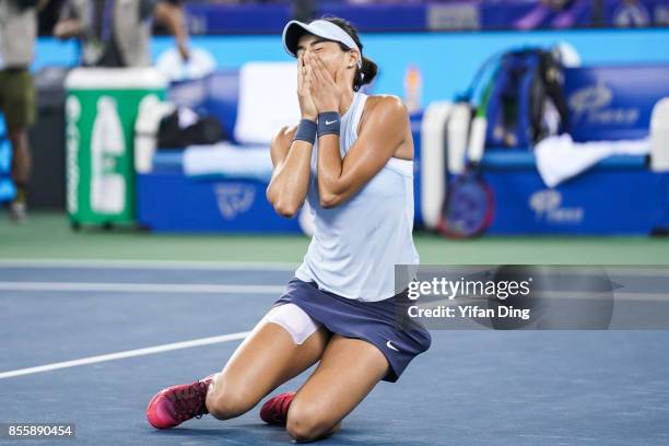 Caroline Garcia reacts after winning the ladies singles final between Ashleigh Barty of Australia and Caroline Garcia of France during Day 7of 2017...