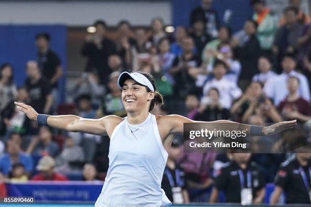 Caroline Garcia reacts after winning the ladies singles final between Ashleigh Barty of Australia and Caroline Garcia of France during Day 7of 2017...