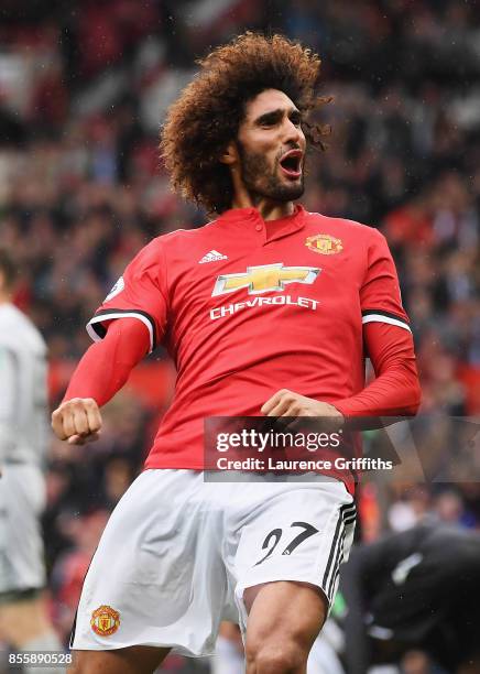 Marouane Fellaini of Manchester United celebrates scroing his side's third goal during the Premier League match between Manchester United and Crystal...