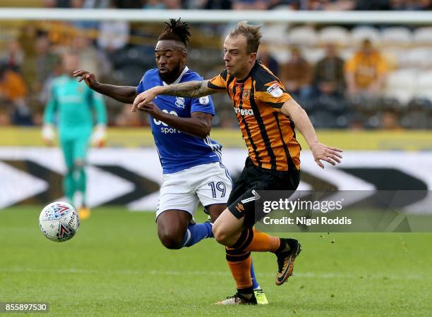 Kamil Grosicki of Hull City challenges Jacques Maghoma of Birmingham City during the Sky Bet Championship match between Hull City and Birmingham City...