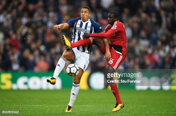 Jake Livermore of West Bromwich Albion and Abdoulaye Doucoure of Watford compete for the ball during the Premier League match between West Bromwich...