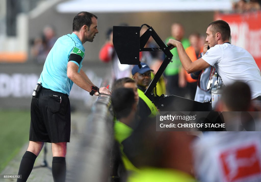 FBL-GER-BUNDESLIGA-AUGSBURG-DORTMUND