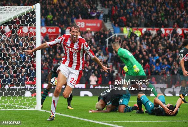 Peter Crouch of Stoke City celerbates scoring his side's second goal during the Premier League match between Stoke City and Southampton at Bet365...