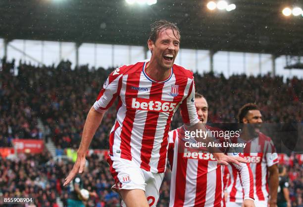 Peter Crouch of Stoke City celebrates scoring his sides second goal during the Premier League match between Stoke City and Southampton at Bet365...
