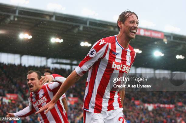 Peter Crouch of Stoke City celebrates scoring his sides second goal during the Premier League match between Stoke City and Southampton at Bet365...