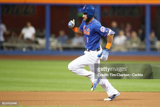 Amed Rosario of the New York Mets running to third after hitting a triple during the Atlanta Braves Vs New York Mets MLB regular season game at Citi...