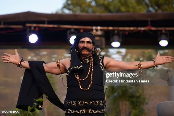 Bollywood actor Mukesh Rishi plays the role of Ravana during the Dussehra festival celebration at Lal Quila Grounds, on September 30, 2017 in New...