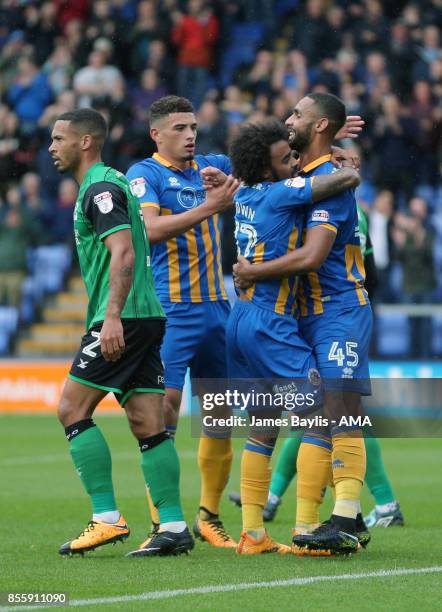 Stefan Payne of Shrewsbury Town celebrates with his team mates after scoring a goal to make it 1-0 during the Sky Bet League One match between...