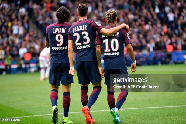 Paris Saint-Germain's Uruguayan forward Edinson Cavani, Paris Saint-Germain's German midfielder Julian Draxler and Paris Saint-Germain's Brazilian...